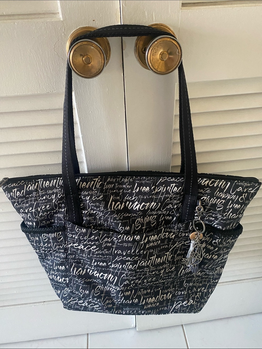 Black & White Script Print Sakroot Tote Bag with Tassel Charm